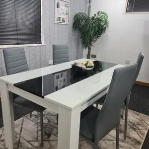 Modern White and Black Wood Dining Table With 4 Grey Chairs