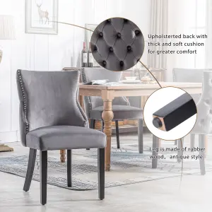 Set of 4 Velvet Upholstered Dining Chairs with Rotatable Adjustment Buttons and Nail Head Trim.