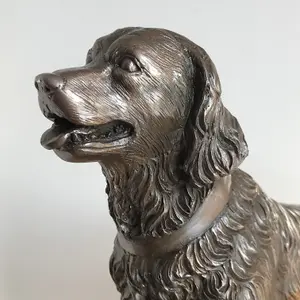 Golden Retriever on Rocks dog figurine in solid cold cast bronze