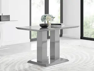 Imperia Grey High Gloss 4 Seater Dining Table with Structural 2 Plinth Column Legs 4 Grey Faux Leather Silver Leg Milan Chairs