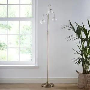 Antique brass 3 light floor lamp with Glass ribbed light shades offering a warm light effect