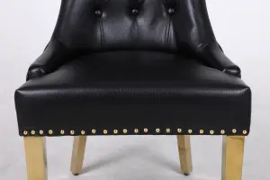 A Pair of Leather Aire Dining Chairs with Golden Legs in Black