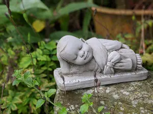 Charming Stone Cast Small Lying Monk in Robe