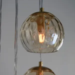 Anson Lighting Iowa 5lt Pendant light finished in Satin brass plate and champagne lustre glass