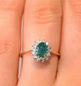 Emerald 0.83Ct And Diamond 9K Gold Ring