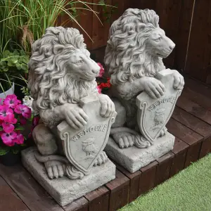 Pair of Gatepost Lion statues with Shield