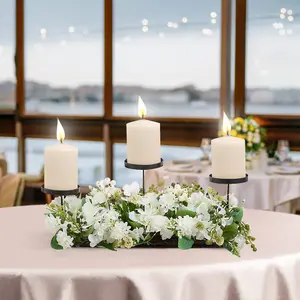 Wedding Decor Candlesticks with Faux Flowers and Warm Light