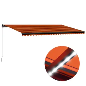 Berkfield Manual Retractable Awning with LED 600x300 cm Orange and Brown