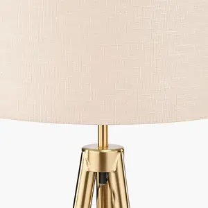 Gold Metal and Wood Grain Tripod Floor Lamp