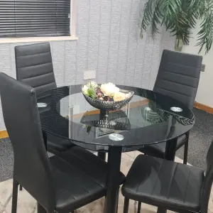 Round Glass Black Kitchen Dining Table With Storage Shelf And 4 Black Metal Chairs Set