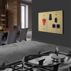 British General Screwless Matt Gold Cooker switch & socket with neon & Black inserts