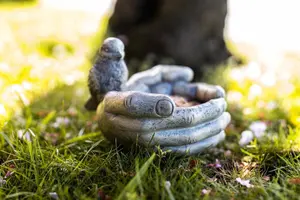 Open Hands with Robin Bird Feeder