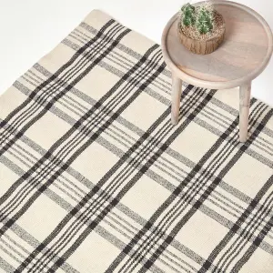 Homescapes Logan Black and White Tartan Check Non-Slip 100% Wool Rug, 70 x 120 cm