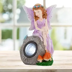 Enchanted Lilac Solar Fairy On Rock Garden Light