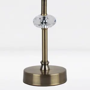 First Choice Lighting Antique Brass Plated Stacked Bedside Table Light with Faceted Acrylic Detailing and White Fabric Shade