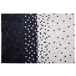 Cowhide Area Rug 140 x 200 cm Black and Beige ERFELEK