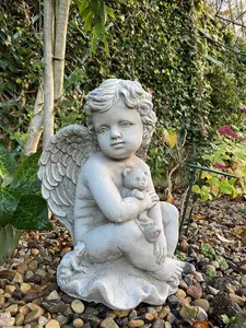 Stone Cast Cherub Ornament with Teddy on Hand