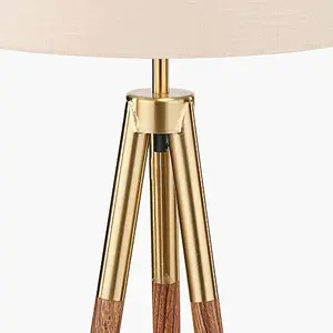 Gold Metal and Wood Grain Tripod Floor Lamp