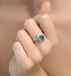 Lab Emerald 1.95Ct And Lab Diamond 1.00Ct Cluster Ring In 18K White Gold