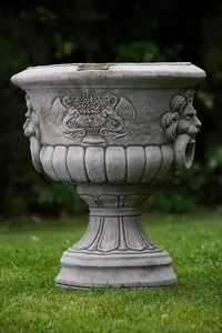 Pair of Lion Head design Stone Vases and Planter Troughs