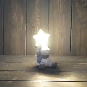 The Satchville Gift Company Reindeer Holding Light Up Star