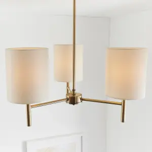 Anson Lighting Phoenix 3lt Semi Flush light finished in Antique brass plate and cream fabric