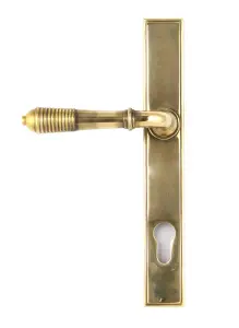 From The Anvil Aged Brass Reeded Slimline Lever Espag. Lock Set