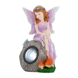 Enchanted Lilac Solar Fairy On Rock Garden Light