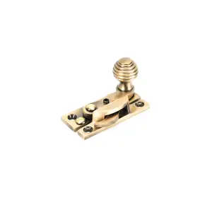 Sash Heritage Claw Fastener with Reeded Knob (Locking) - Antique Brass