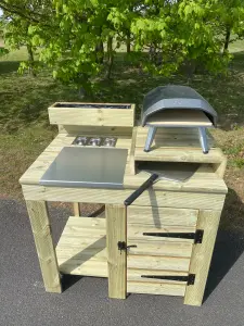 outdoor pizza oven table with built in cupboard storage, raised pizza stand and planter top