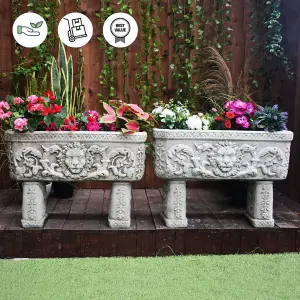 Pair of Lion design Stone Troughs on legs