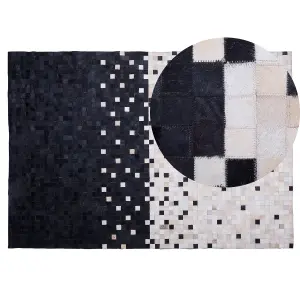 Cowhide Area Rug 140 x 200 cm Black and Beige ERFELEK