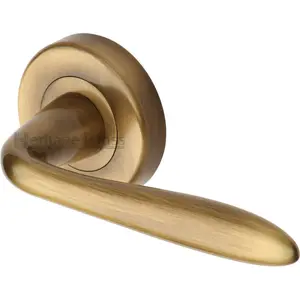 Heritage Door Handle Lever Latch on Round Rose Sutton Design (Set of 2) Antique Brass