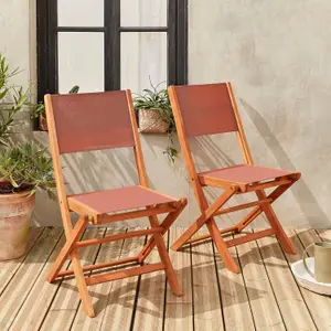 sweeek. Pair of foldable wooden garden chairs Almeria Terracotta 50x58.7x89 cm