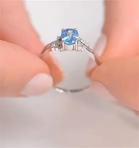 Blue Topaz 0.94Ct And Diamond 9K White Gold Ring