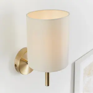 Anson Lighting Phoenix Wall light finished in Antique brass plate and cream fabric