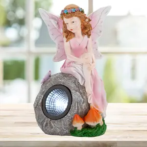 Enchanted Pink Solar Fairy On Rock Garden Light