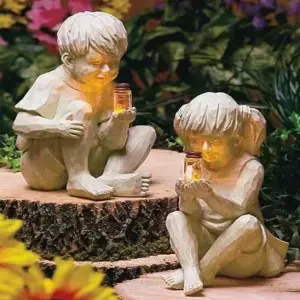 Solar Powered Boy and Girl with Fireflies Statue Resin Home Garden Ornament