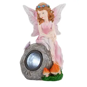 Enchanted Pink Solar Fairy On Rock Garden Light