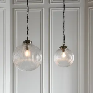 Anson Lighting Boston Pendant light finished in Antique brass plate and clear ribbed glass