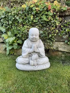 Small Monk on a cushion Garden Ornament