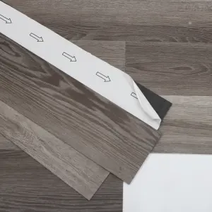 GoodHome Bossa Nova Brown Plain Wood effect Self-adhesive Luxury vinyl tile, 0.97m²