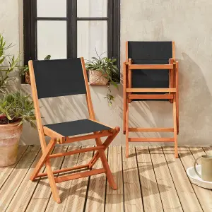 sweeek. Pair of foldable wooden garden chairs Almeria Black 54x58.7x89 cm