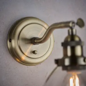 Anson Lighting Pampa Wall light finished in Antique brass plate and clear glass