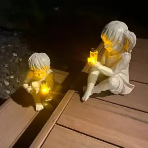 Solar Powered Boy and Girl with Fireflies Statue Resin Home Garden Ornament