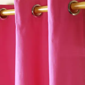 Homescapes Cotton Plain Hot Pink Ready Made Eyelet Curtain Pair, 117 x 137 cm