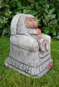 Adorable Hedgehog in chair garden ornament