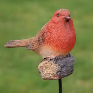 Robin sitting on Stake Garden decoration