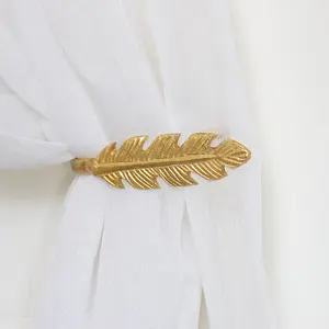 Melody Maison Pair of Gold Feather Curtain Holdbacks