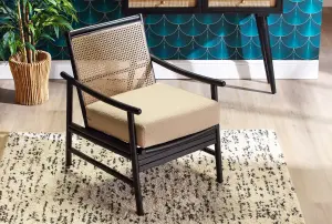 Borneo Rattan Accent Chair Indoor Black with Boucle Cushion